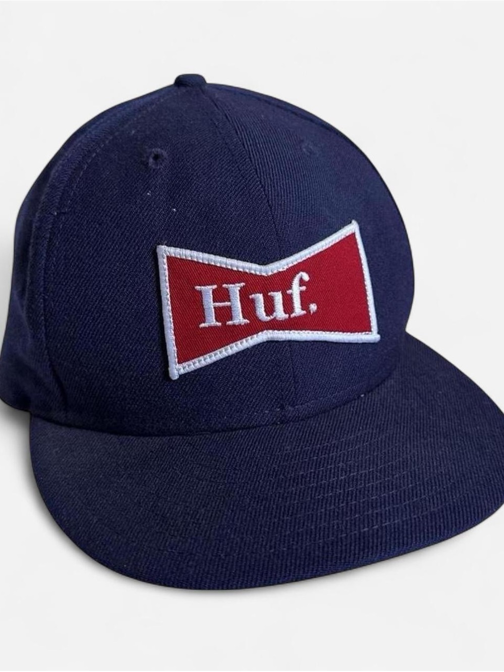 HUF Navy Baseball Cap with Red Logo Patch